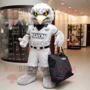 Silver Hawk mascot costume character dressed with a Polo Tee and Tote bags