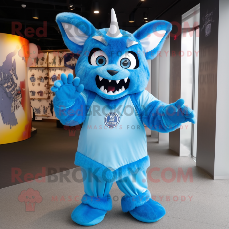 Sky Blue Devil mascot costume character dressed with a Parka and Caps Sky Blue Devil mascot costume character dressed with a Parka and Caps