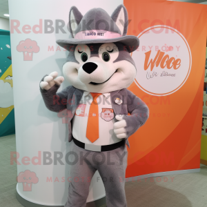 Peach Say Wolf mascot costume character dressed with a Blazer and Hats