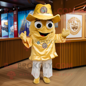 Gold Ceviche mascot costume character dressed with a Polo Tee and Hat pins