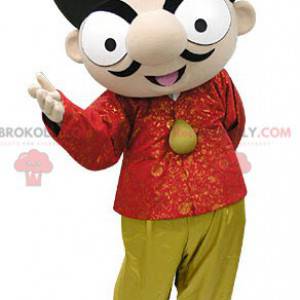 Brown boy mascot with red and yellow outfit - Redbrokoly.com