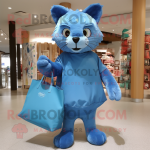 Blue Cat mascot costume character dressed with a Cover-up and Tote bags