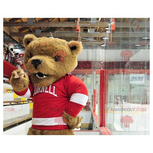 Mascotte d'ours brun avec un pull rouge et blanc -