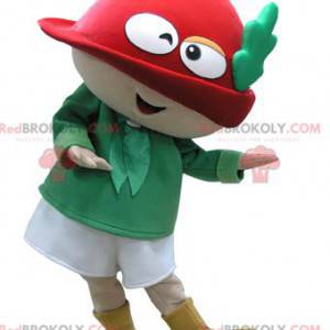 Mascotte de bonhomme de lutin vert et rouge avec un chapeau -