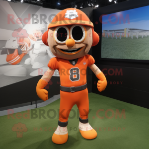 Orange American Football Helmet mascot costume character dressed with a Coat and Suspenders