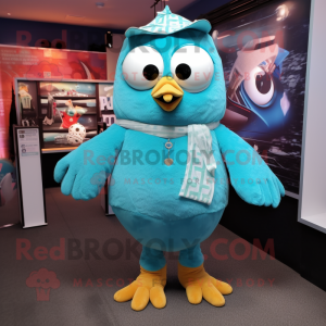 Turquoise Owl mascot costume character dressed with a Jumpsuit and Suspenders