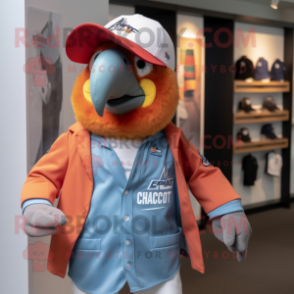 Rust Macaw mascot costume character dressed with a Blazer and Caps