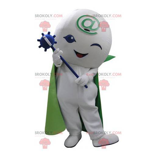 Mascote do boneco de neve branco com uma capa e uma varinha -
