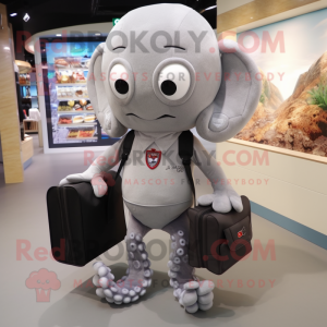 Gray Octopus mascot costume character dressed with a Polo Shirt and Wallets