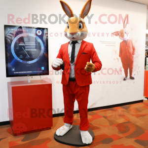 Red Wild Rabbit mascot costume character dressed with a Suit Jacket and Smartwatches