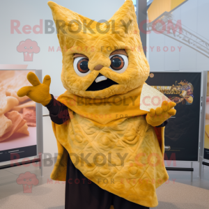 Gold Nachos mascot costume character dressed with a Cover-up and Mittens