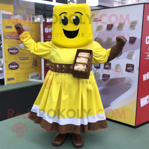 Yellow Chocolate Bar mascot costume character dressed with a Skirt and Wraps