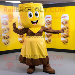 Yellow Chocolate Bar mascot costume character dressed with a Skirt and Wraps