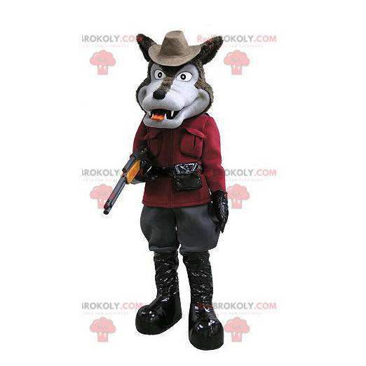 Mascotte de loup marron et gris en tenue de chasseur -