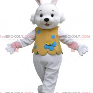 Mascote coelho branco com roupa laranja - Redbrokoly.com