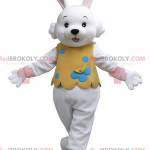 Wit konijn mascotte met een oranje outfit - Redbrokoly.com