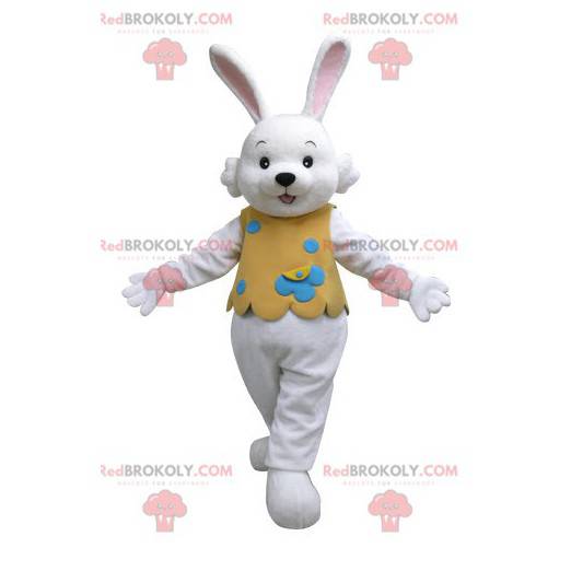 Mascote coelho branco com roupa laranja - Redbrokoly.com