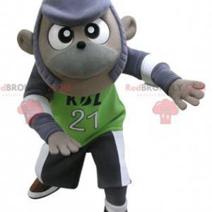 Mascote macaco roxo e cinza em roupas esportivas -