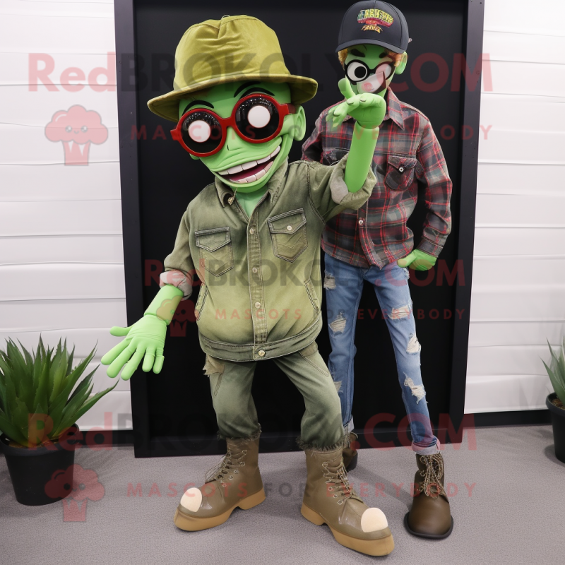 Olive Zombie mascot costume character dressed with a Boyfriend Jeans and Sunglasses Olive Zombie mascot costume character dressed with a Boyfriend Jeans and Sunglasses