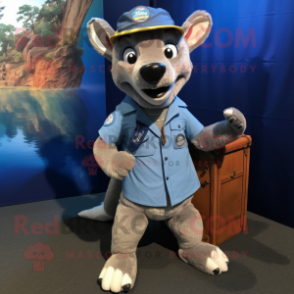 Blue Thylacosmilus mascot costume character dressed with a Cargo Shorts and Lapel pins