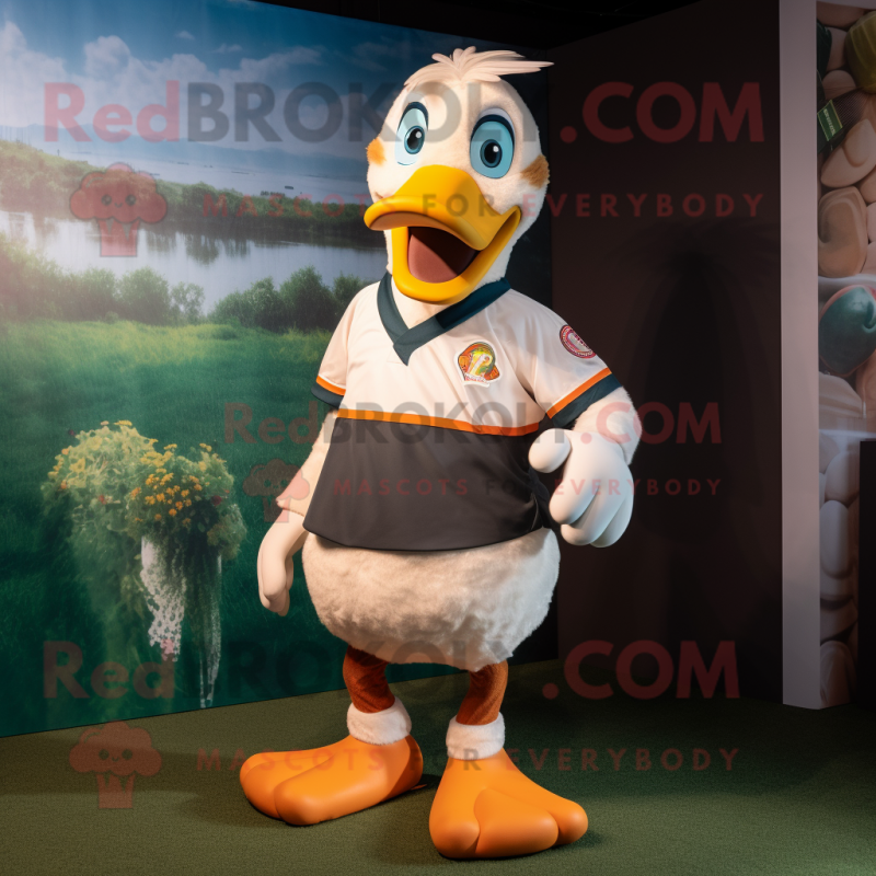Tan Muscovy Duck mascot costume character dressed with a Rugby Shirt and Anklets Tan Muscovy Duck mascot costume character dressed with a Rugby Shirt and Anklets