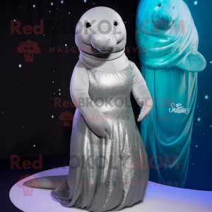 Silver Stellar'S Sea Cow mascot costume character dressed with a Empire Waist Dress and Ties