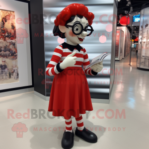 Red Mime mascot costume character dressed with a Culottes and Reading glasses