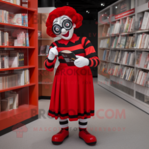 Red Mime mascot costume character dressed with a Culottes and Reading glasses