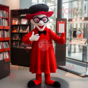 Red Mime mascot costume character dressed with a Culottes and Reading glasses