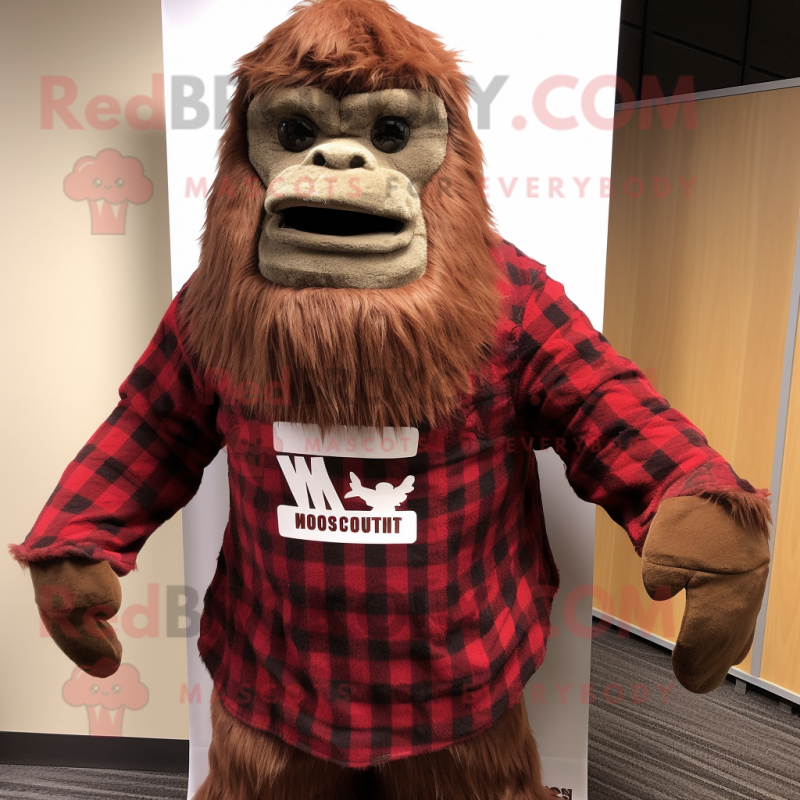 Maroon Sasquatch mascot costume character dressed with a Flannel Shirt and Scarves