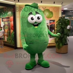 Forest Green Cucumber mascot costume character dressed with a Graphic Tee and Shoe clips