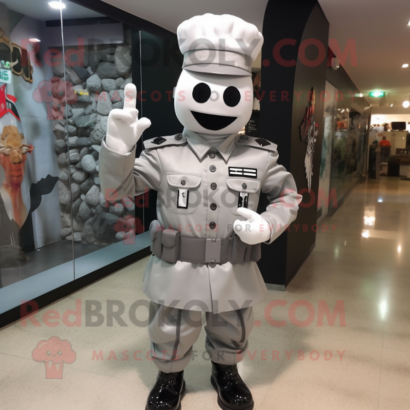 Silver Army Soldier mascot costume character dressed with a Blouse and Cufflinks Silver Army Soldier mascot costume character dressed with a Blouse and Cufflinks