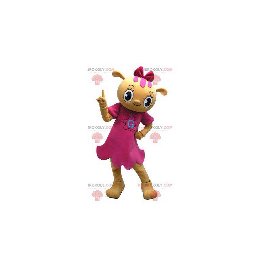 Mascota del oso de peluche amarillo vestida con un vestido rosa