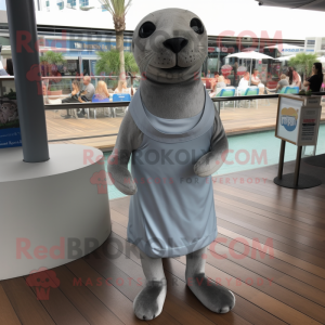 Silver Sea Lion mascot costume character dressed with a Mini Dress and Shoe laces