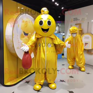 Gold Juggle mascot costume character dressed with a Raincoat and Cummerbunds