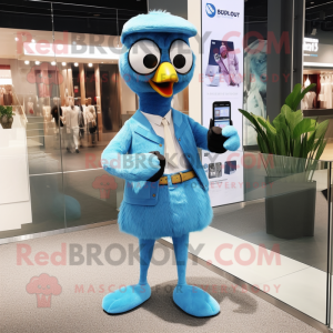 Sky Blue Ostrich mascot costume character dressed with a Jacket and Smartwatches