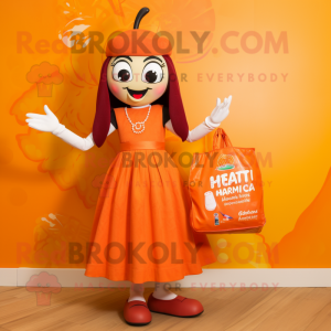 Orange Tikka Masala mascot costume character dressed with a Cocktail Dress and Tote bags