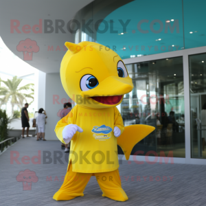 Yellow Dolphin mascot costume character dressed with a Suit and Keychains