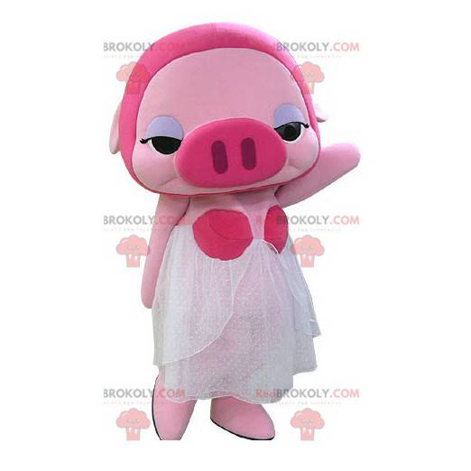 Mascotte de cochon rose maquillée avec une robe blanche -