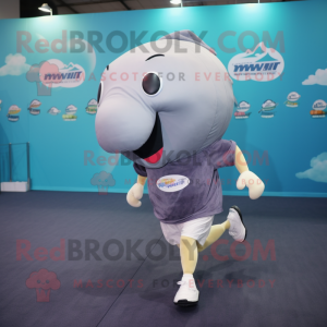 Silver Whale mascot costume character dressed with a Running Shorts and Tie pins