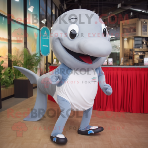 Silver Whale mascot costume character dressed with a Running Shorts and Tie pins