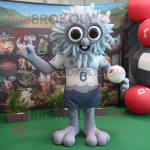 Silver Kraken mascot costume character dressed with a Rugby Shirt and Reading glasses