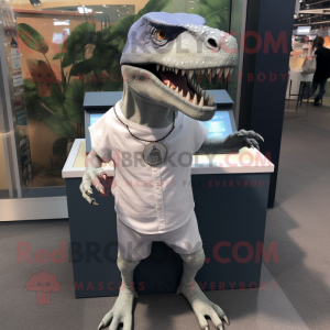 Gray Tyrannosaurus mascot costume character dressed with a Henley Tee and Necklaces