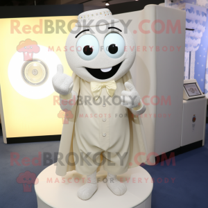 Cream Engagement Ring mascot costume character dressed with a Cardigan and Cufflinks