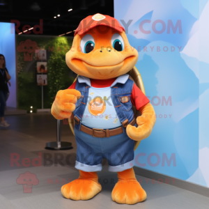 Orange Turtle mascot costume character dressed with a Denim Shirt and Brooches