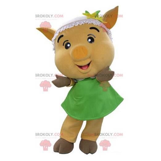 Geel varken mascotte met een groene jurk - Redbrokoly.com