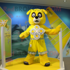 Yellow Celtic Cross mascot costume character dressed with a Swimwear and Bracelet watches