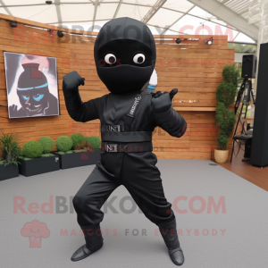 Black Ninja mascot costume character dressed with a Jumpsuit and Suspenders