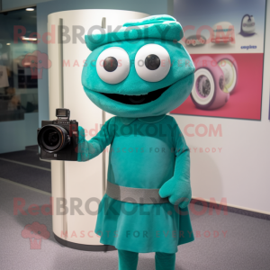 Teal Camera mascot costume character dressed with a Wrap Dress and Cummerbunds