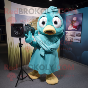 Teal Camera mascot costume character dressed with a Wrap Dress and Cummerbunds
